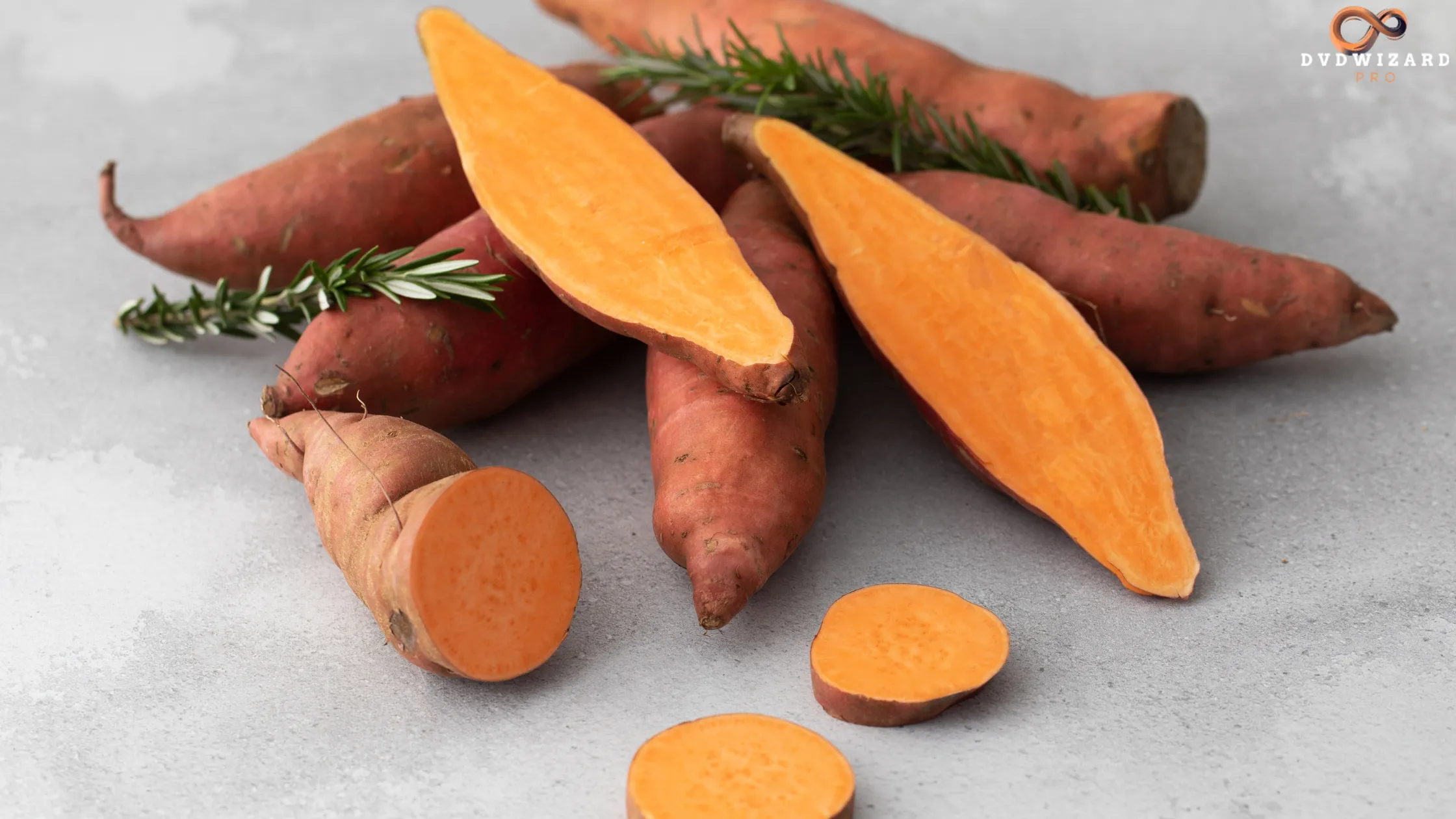 Fresh orange-fleshed sweet potatoes sliced open showing vibrant interior, highlighting their journey to Texas.